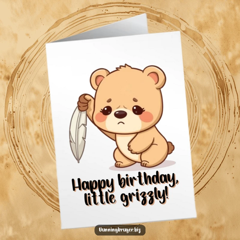 Funny Free Printable Birthday Card: A determined bear cub with a furrowed brow strains with all its might to lift a single feather.